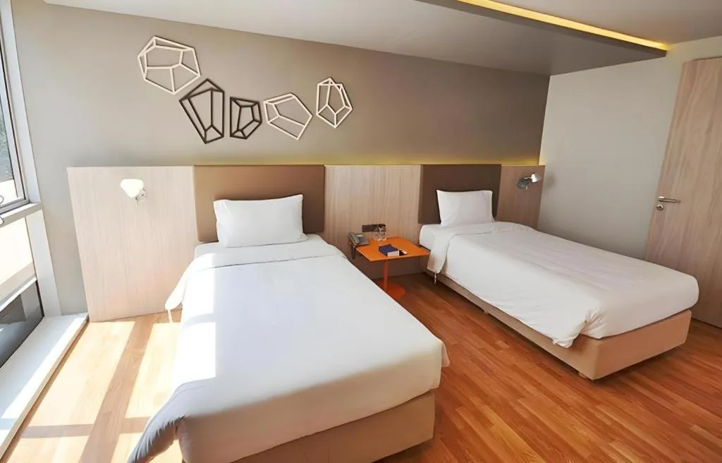 Bed in The Heritage Silom Hotel