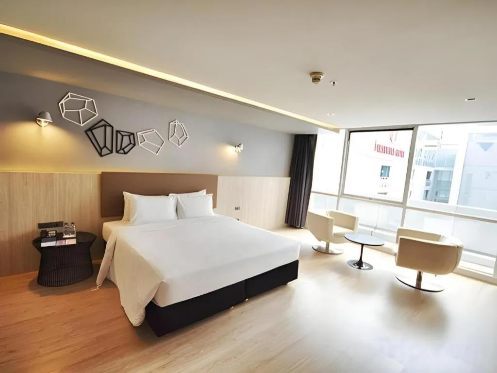 Bed in The Heritage Silom Hotel