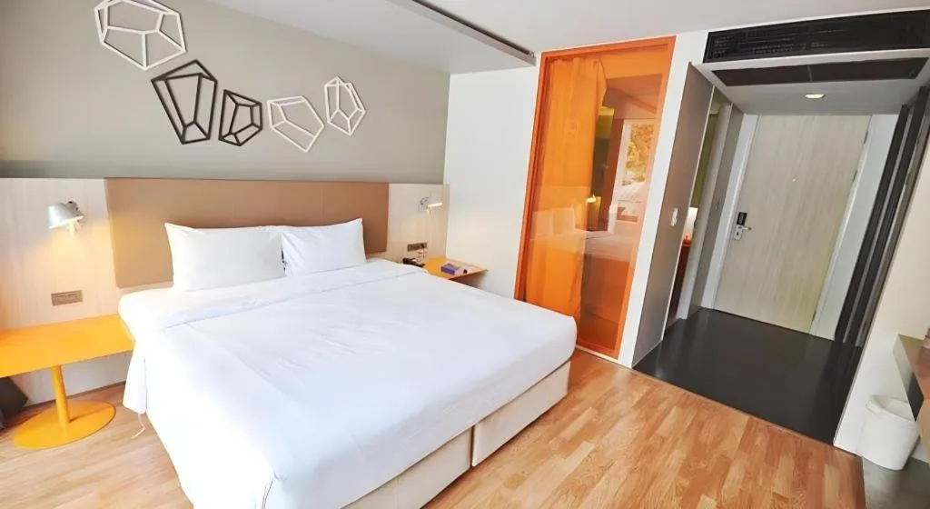 Bed in The Heritage Silom Hotel