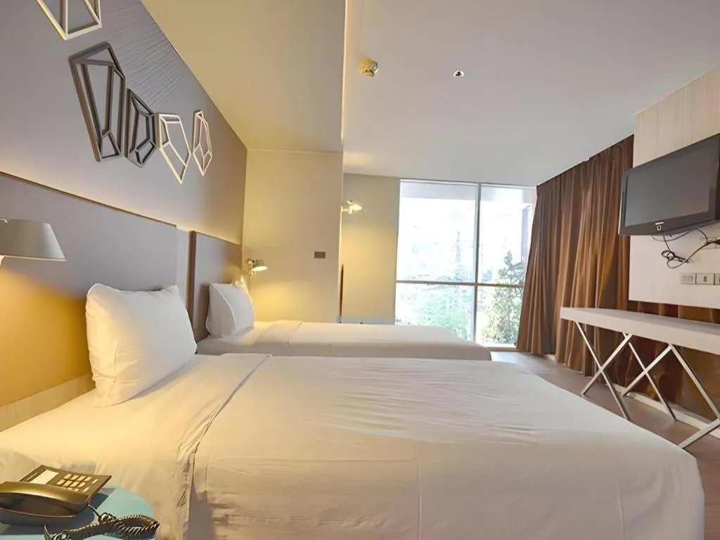 Bed in The Heritage Silom Hotel