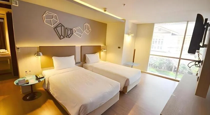 Bed in The Heritage Silom Hotel