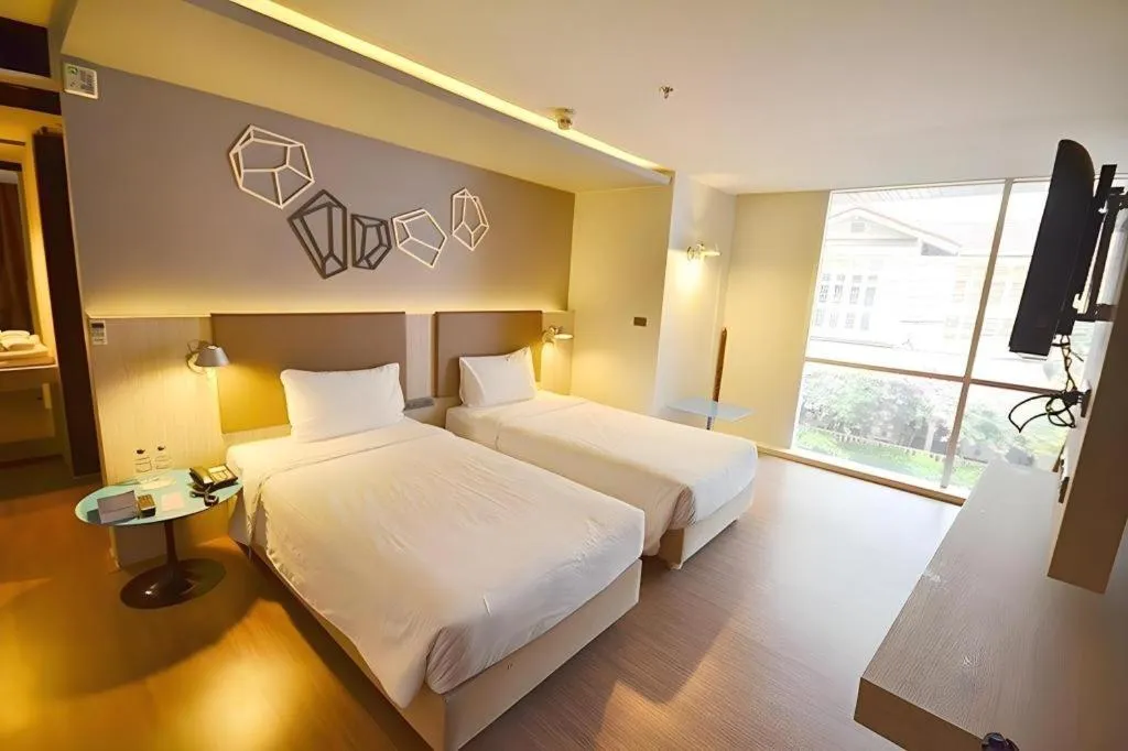 Bed in The Heritage Silom Hotel