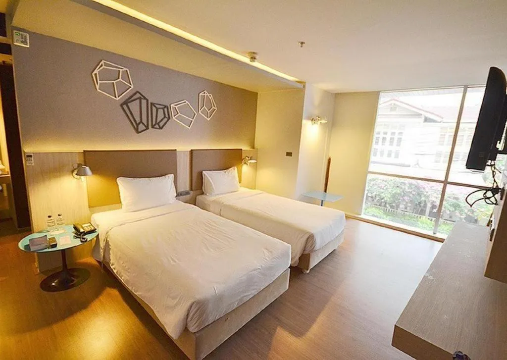 Bed in The Heritage Silom Hotel
