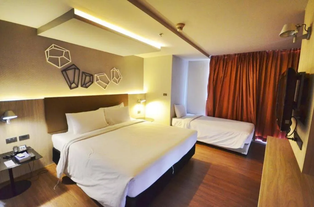 Bed in The Heritage Silom Hotel