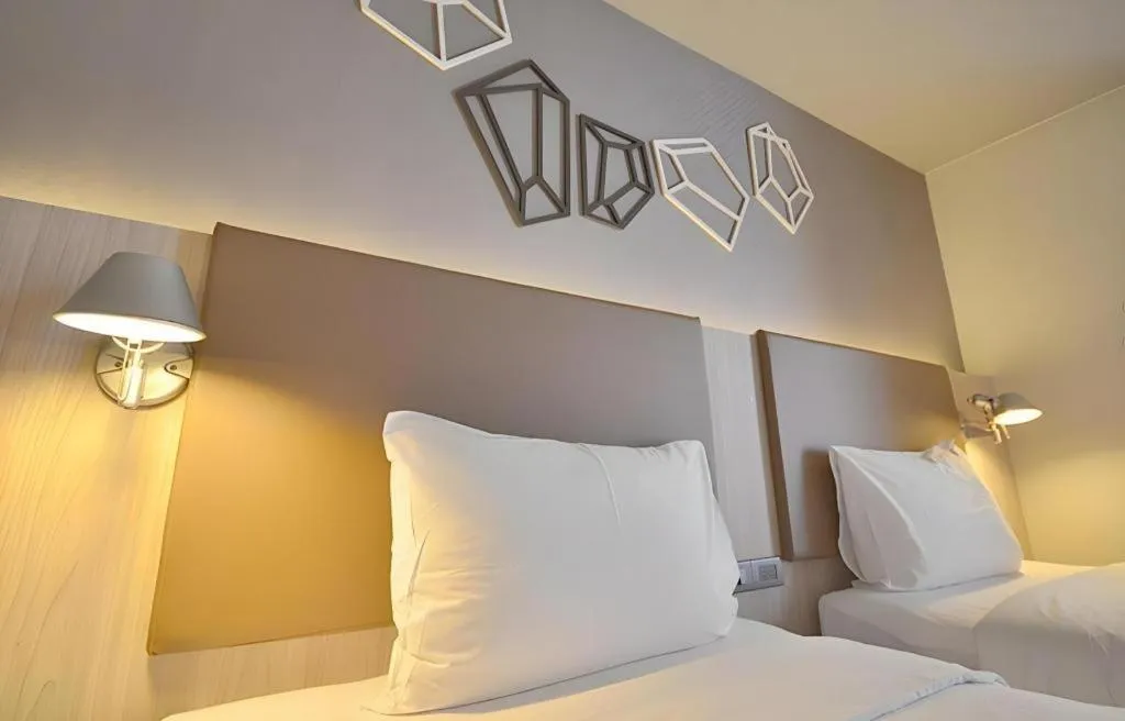 Bed in The Heritage Silom Hotel