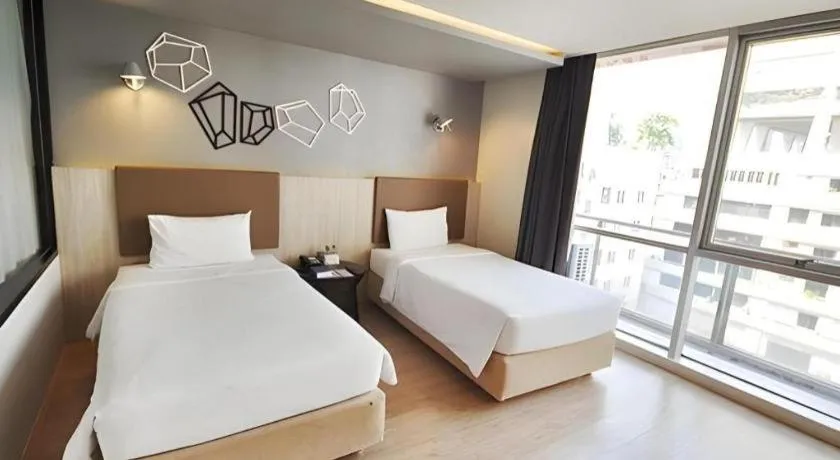 Bed in The Heritage Silom Hotel