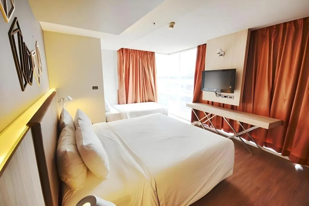 Bed in The Heritage Silom Hotel