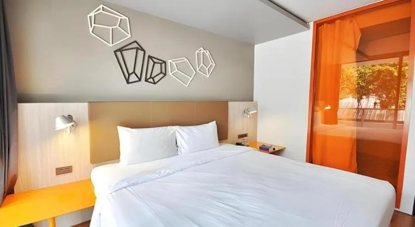 Bed in The Heritage Silom Hotel