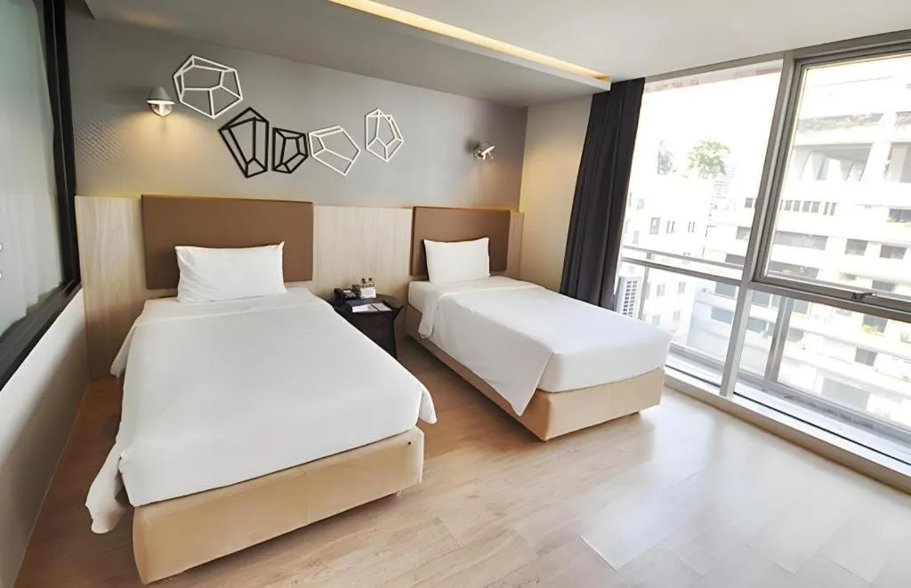 Bed in The Heritage Silom Hotel