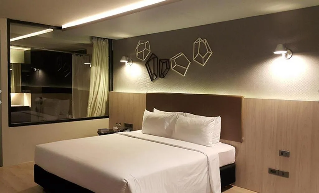 Bed in The Heritage Silom Hotel