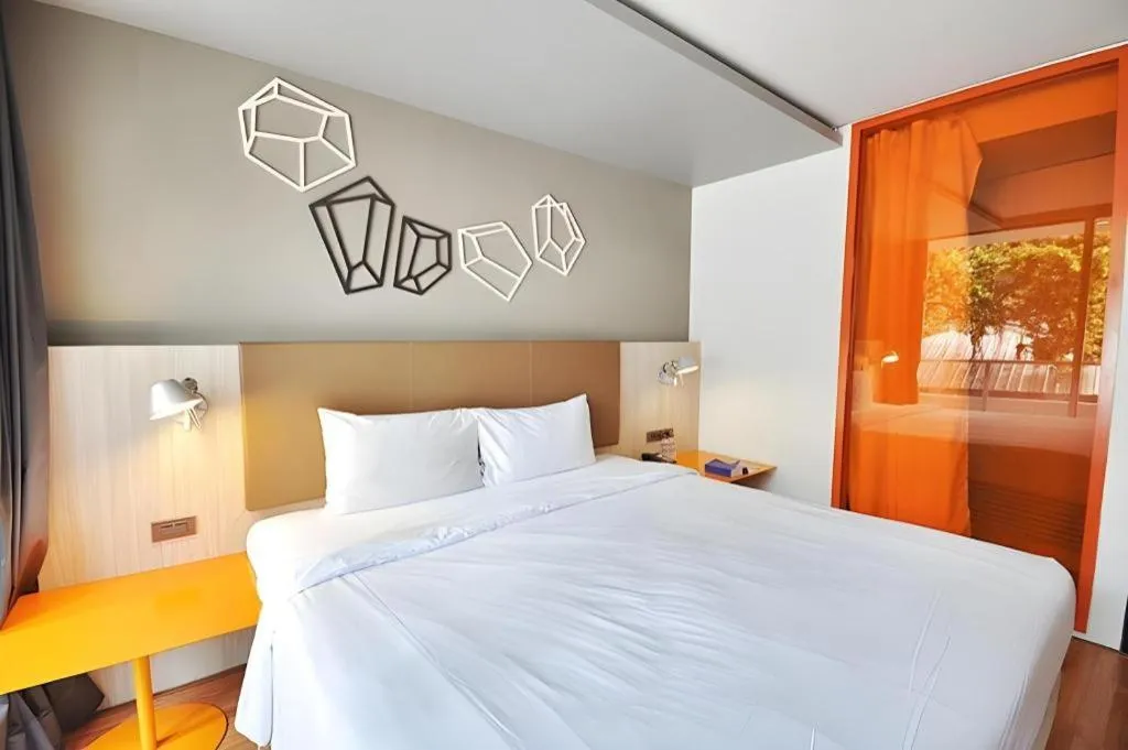 Bed in The Heritage Silom Hotel