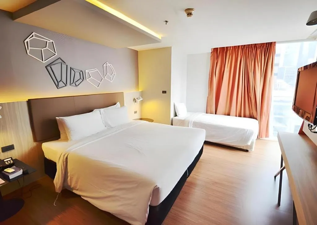 Bed in The Heritage Silom Hotel