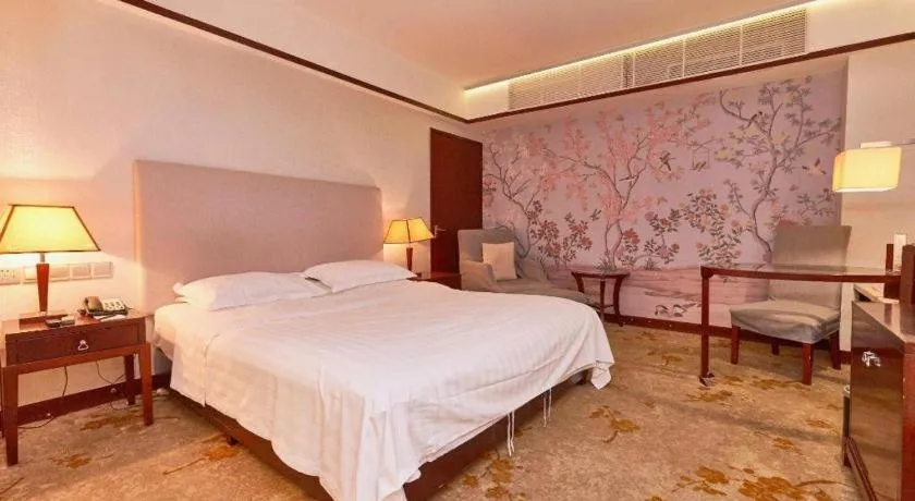 Bed in Starmoon Hotel