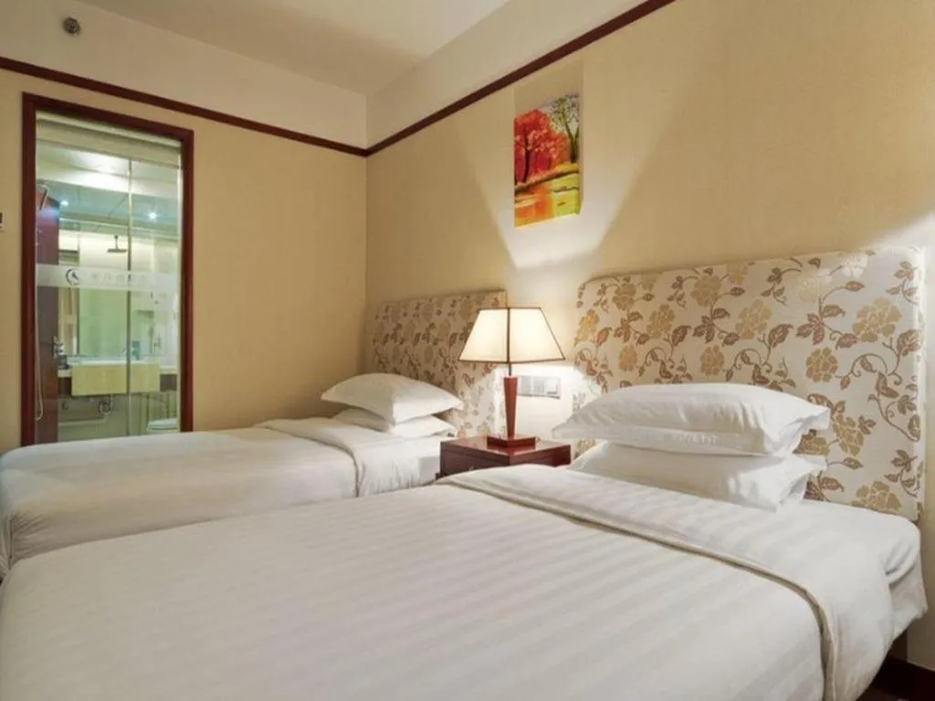 Bed in Starmoon Hotel