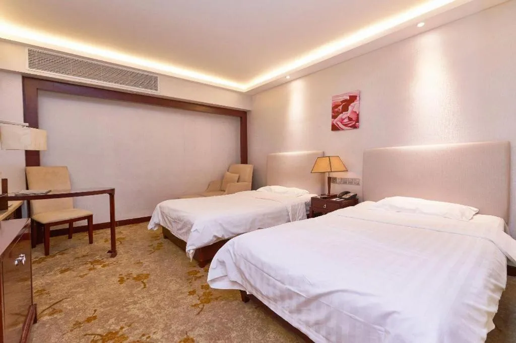 Bed in Starmoon Hotel