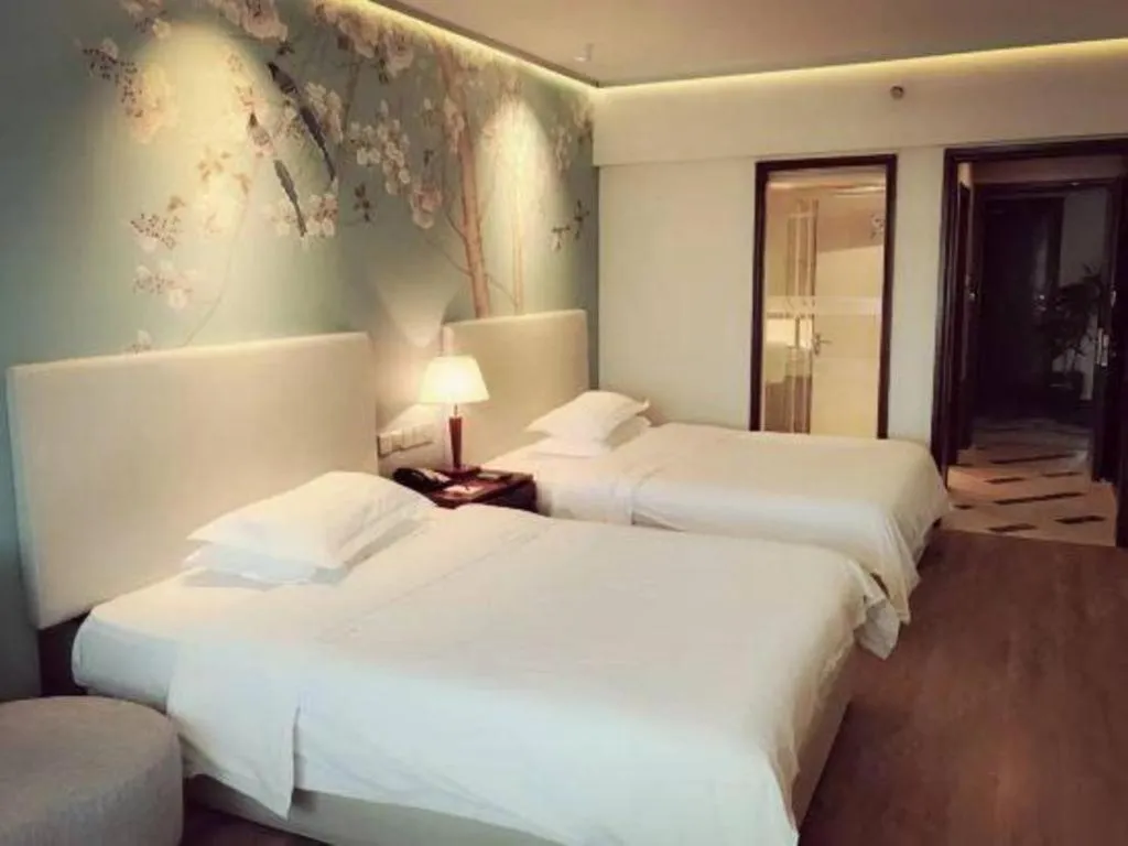 Bed in Starmoon Hotel