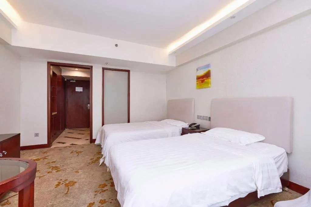 Bed in Starmoon Hotel