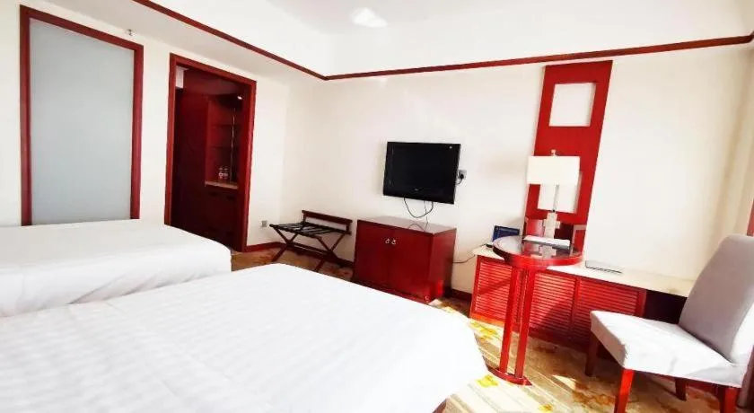 Bed in Starmoon Hotel