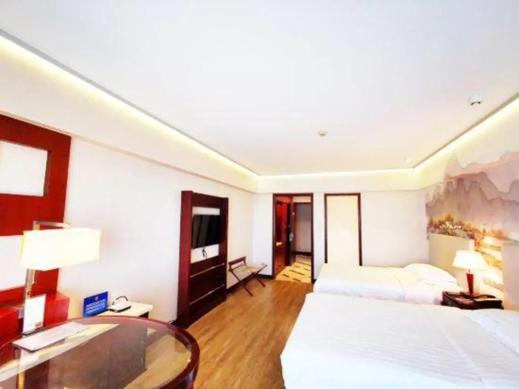 Bed in Starmoon Hotel