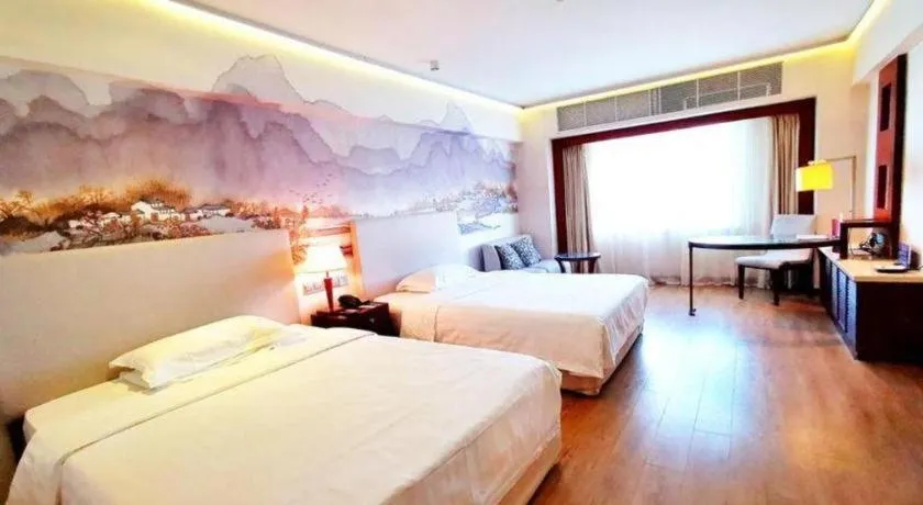 Bed in Starmoon Hotel