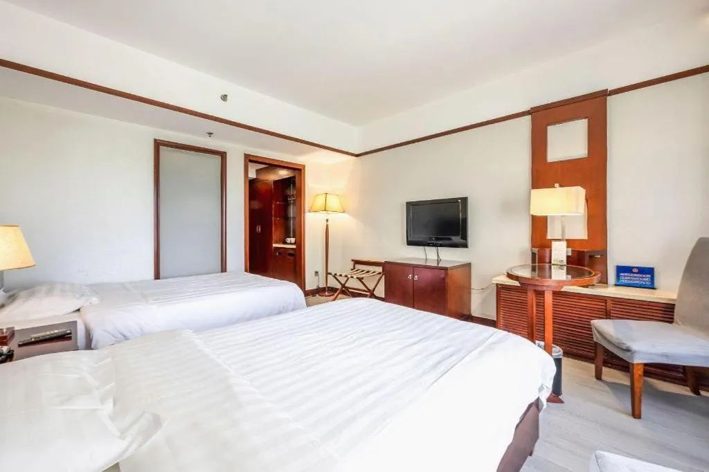 Bed in Starmoon Hotel