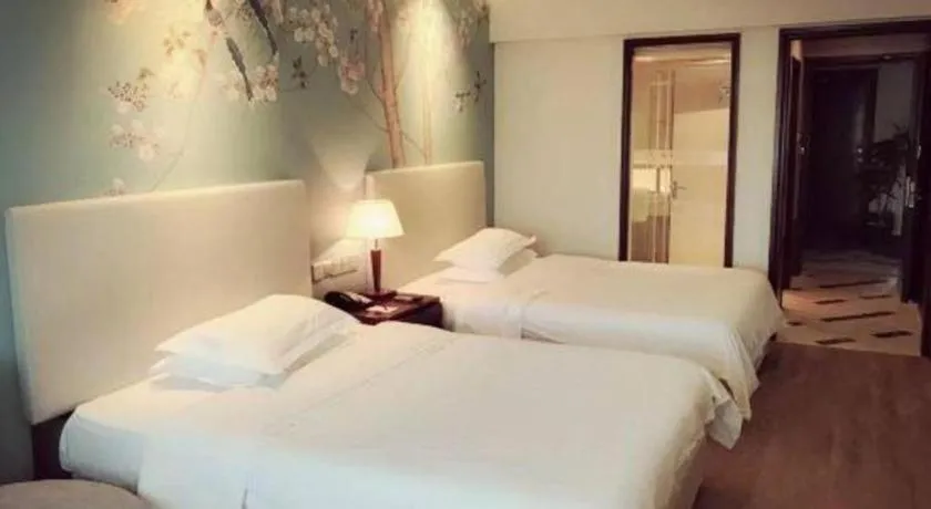 Bed in Starmoon Hotel