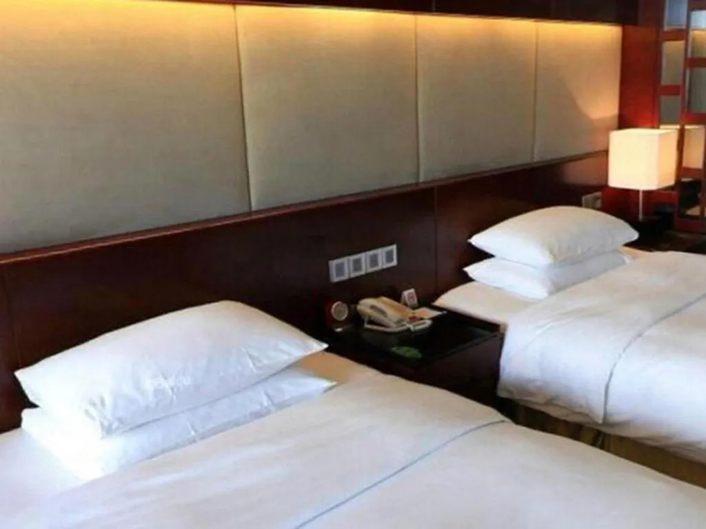 Bed in Grand Metropark Hotel Chongqing