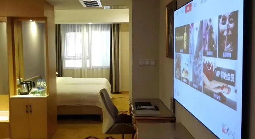 Bed in GreenTree Inn Shenzhen DonGMEn Business Hotel