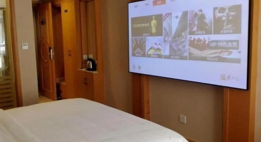 Bed in GreenTree Inn Shenzhen DonGMEn Business Hotel