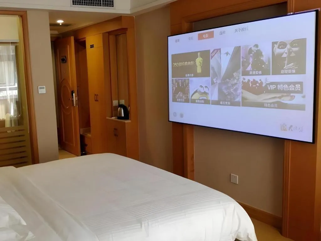 Bed in GreenTree Inn Shenzhen DonGMEn Business Hotel