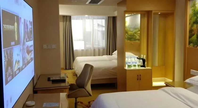 Bed in GreenTree Inn Shenzhen DonGMEn Business Hotel