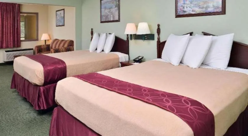 Bed in Americas Best Value Inn Gonzales