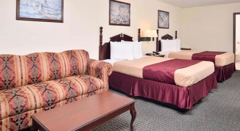 Bed in Americas Best Value Inn Gonzales