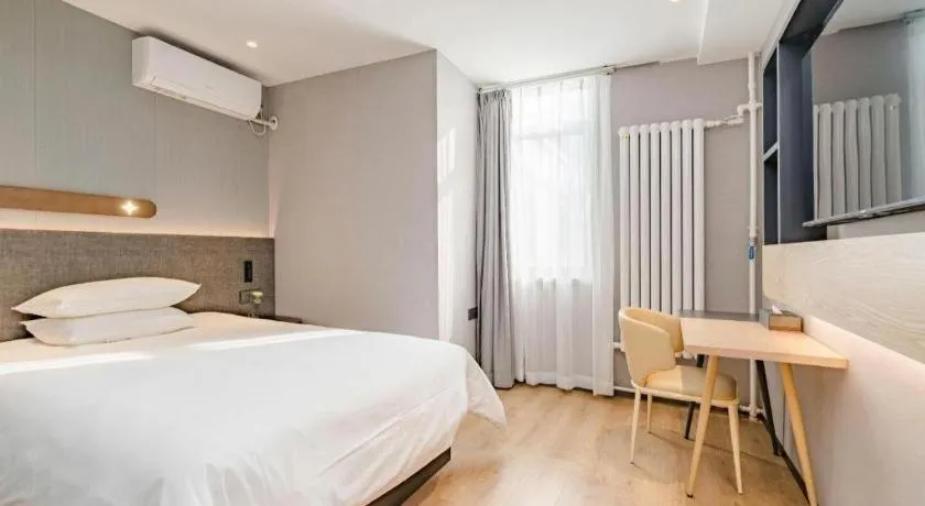 Bed in Jinjiang Inn Qingdao Development Zone Jinggangshan Rd.