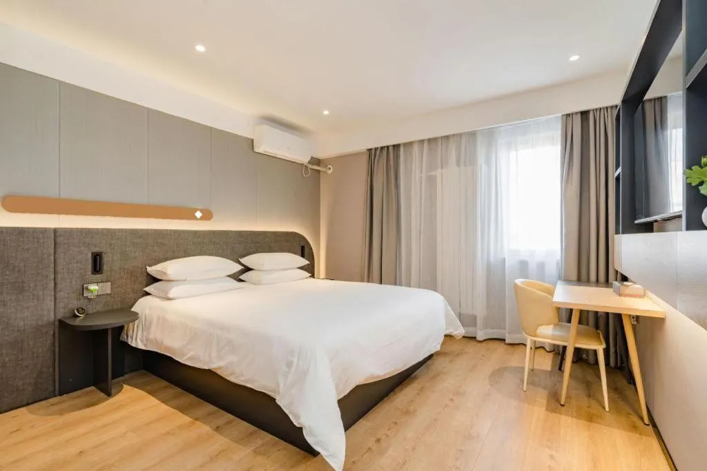 Bed in Jinjiang Inn Qingdao Development Zone Jinggangshan Rd.