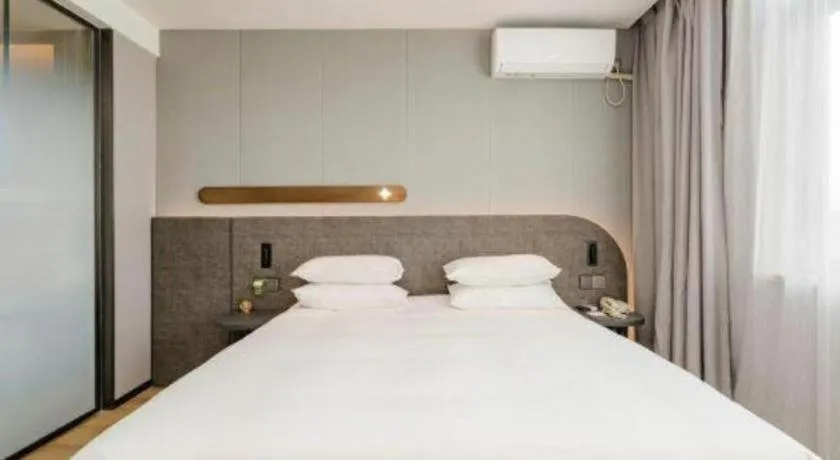 Bed in Jinjiang Inn Qingdao Development Zone Jinggangshan Rd.