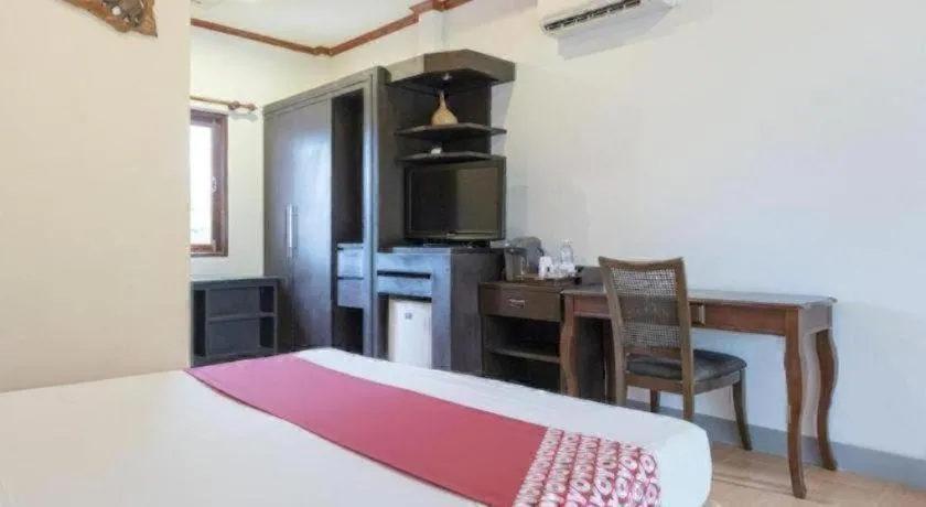 Bed in OYO 1046 Noppharat resort