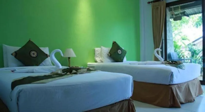 Bed in OYO 1046 Noppharat resort