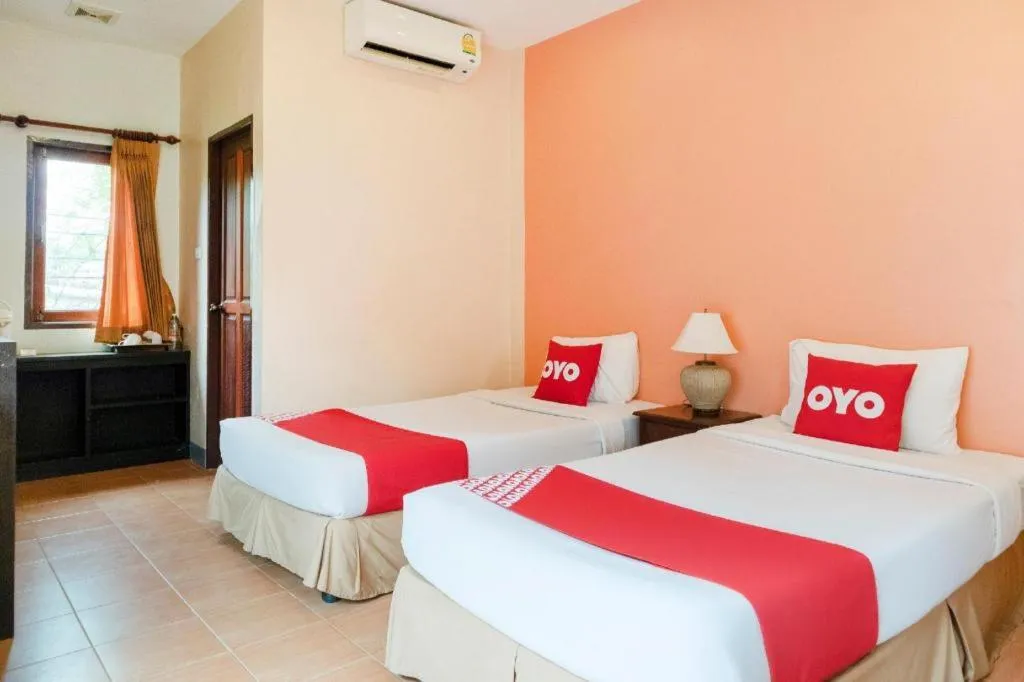 Bed in OYO 1046 Noppharat resort
