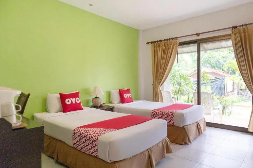 Bed in OYO 1046 Noppharat resort