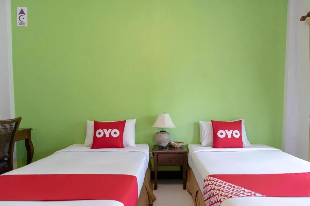 Bed in OYO 1046 Noppharat resort