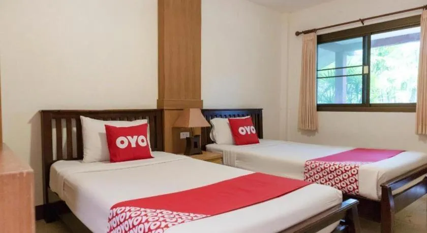 Bed in OYO 1046 Noppharat resort