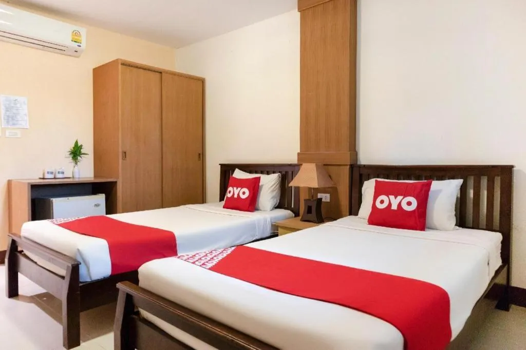 Bed in OYO 1046 Noppharat resort