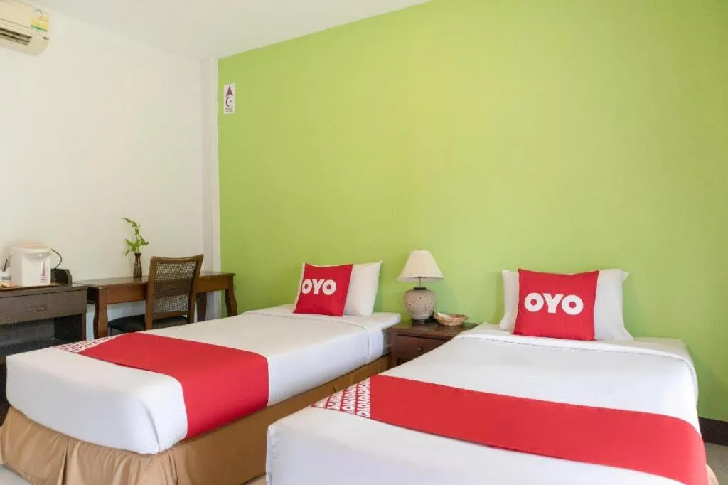 Bed in OYO 1046 Noppharat resort