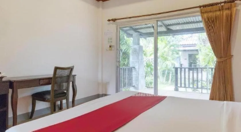 Bed in OYO 1046 Noppharat resort