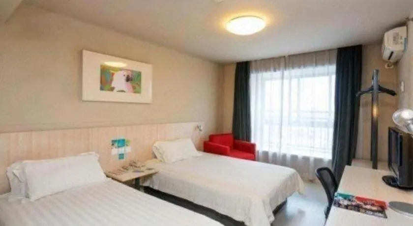 Bed in Jinjiang Inn Wuhu Fangte Tech Museum Metro Station