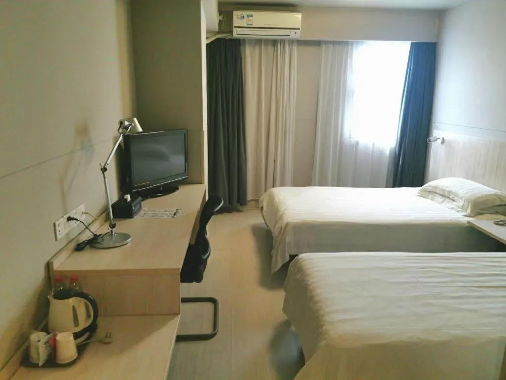 Bed in Jinjiang Inn Wuhu Fangte Tech Museum Metro Station