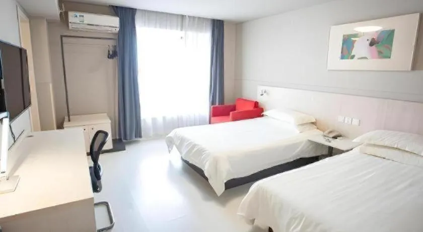 Bed in Jinjiang Inn Wuhu Fangte Tech Museum Metro Station