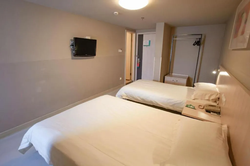 Bed in Jinjiang Inn Wuhu Fangte Tech Museum Metro Station