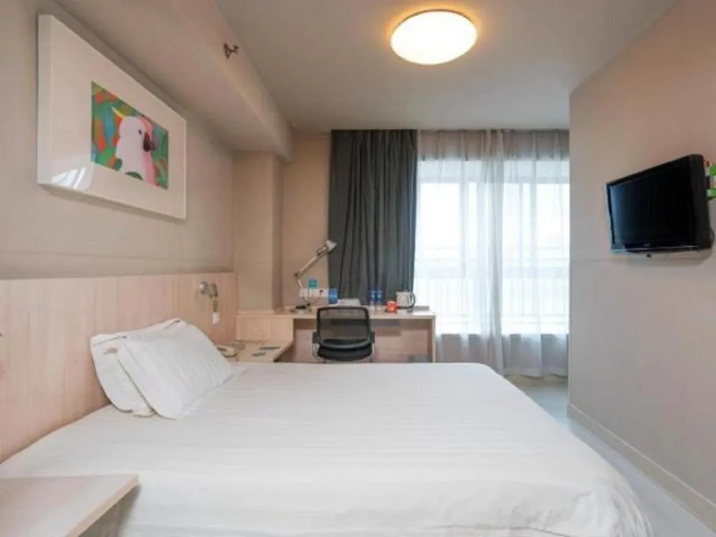 Bed in Jinjiang Inn Wuhu Fangte Tech Museum Metro Station